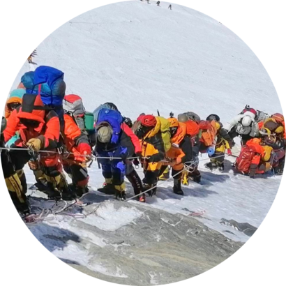 A sprawling queue of climbers line a path up Mount Everest just below Camp 4, in Nepal. Seasoned mountaineers say the Nepal government’s failure to limit the number of climbers on Everest has resulted in dangerous overcrowding and a greater number of deaths; May 22, 2019.